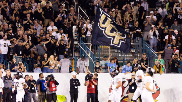 Dec 3, 2022; New Orleans, Louisiana, USA; UCF Knights fans react to a touchdown against the Tulane Green Wave during the second half at Yulman Stadium.