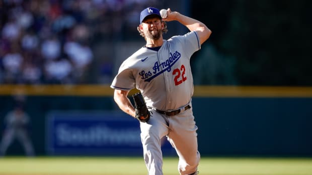 Jun 27, 2023; Denver, Colorado, USA; Los Angeles Dodgers starting pitcher Clayton Kershaw (22) pitches in the first inning against the Colorado Rockies at Coors Field.