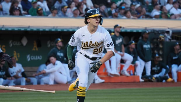 Oakland Athletics second baseman Zack Gelof (20) runs as he gets his first MLB hit with an RBI double against the Minnesota Twins during the third inning at Oakland-Alameda County Coliseum.