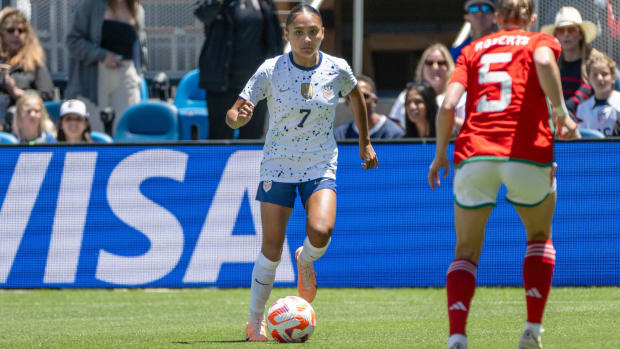 USWNT forward Alyssa Thompson controls the ball in a friendly against Wales ahead of the World Cup.