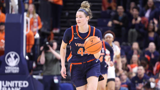 McKenna Dale dribbles the ball down the floor during the Virginia women's basketball game against Virginia Tech at John Paul Jones Arena.