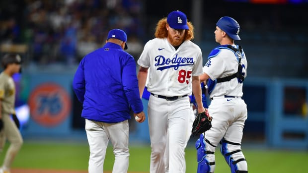 May 12, 2023; Los Angeles, California, USA; Los Angeles Dodgers starting pitcher Dustin May (85) is relieved against the San Diego Padres during the seventh inning at Dodger Stadium.