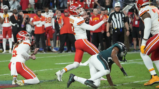 Harrison Butker kicks the game-winning field goal in Super Bowl LVII