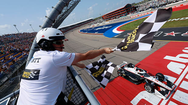 Josef Newgarden crosses the finish line with a win for the third time this season and fifth win overall at Iowa Speedway. Photo courtesy IndyCar.