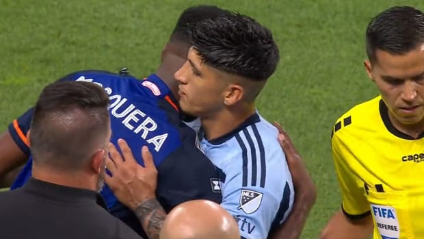 Alan Pulido pictured (center) hugging Yerson Mosquera just 60 seconds after headbutting him during a Leagues Cup game in July 2023