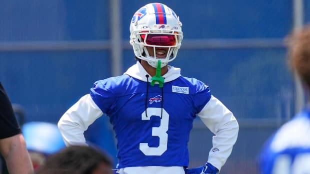 Bills safety Damar Hamlin stands with his hands on his hips at a minicamp practice.