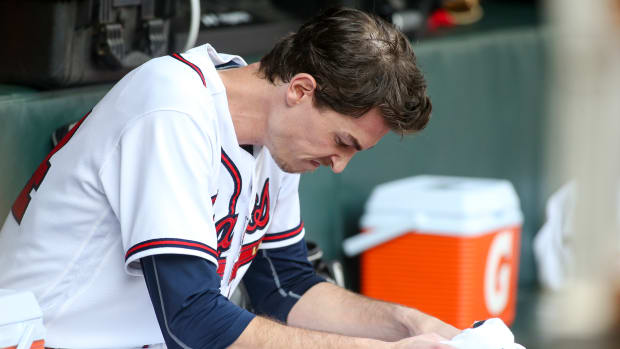 Oct 11, 2022; Atlanta, Georgia, USA; Atlanta Braves starting pitcher Max Fried (54) sits in the dugout after being pulled against the Philadelphia Phillies in the fourth inning during game one of the NLDS for the 2022 MLB Playoffs at Truist Park.