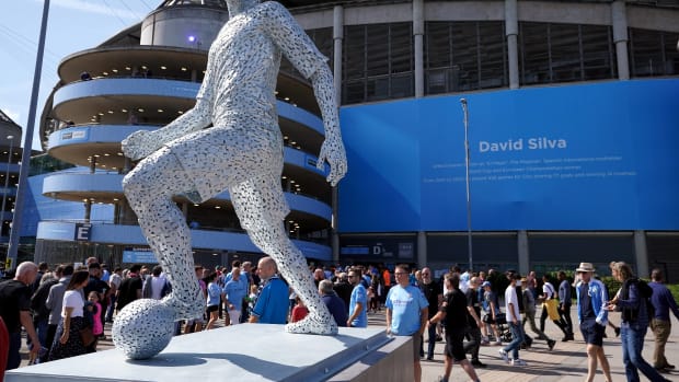 A statue celebrating the Manchester City career of David Silva pictured outside the Etihad Stadium after being unveiled in August 2021