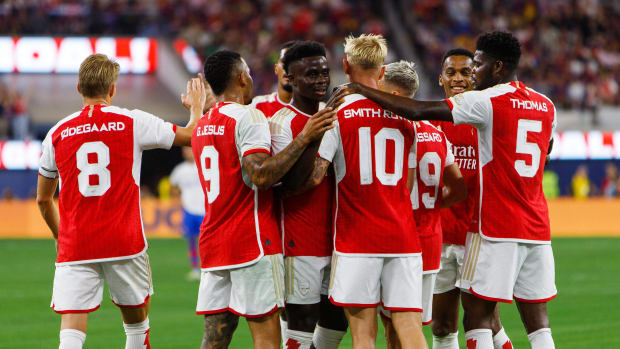 Arsenal's players pictured celebrating a goal during a 5-3 pre-season win over Barcelona in July 2023