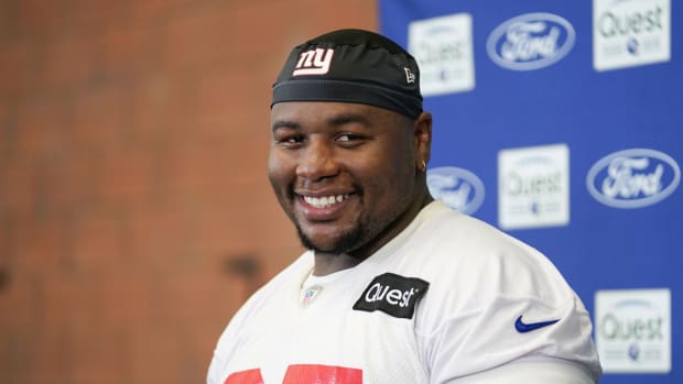 Jul 27, 2023; East Rutherford, NJ, USA; New York Giants defensive tackle Dexter Lawrence (97) talks to reporters after day two of training camp at the Quest Diagnostics Training Facility.