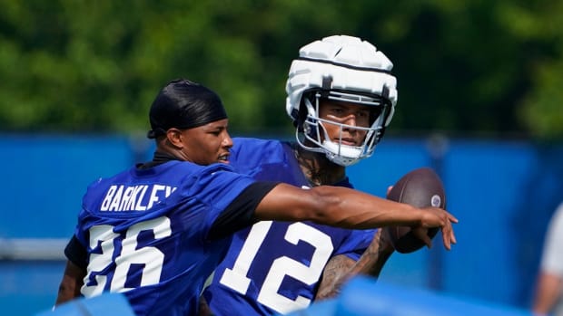 New York Giants running back Saquon Barkley (26) and tight end Darren Waller (12) on the first day of training camp in East Rutherford on Wednesday, July 26, 2023.