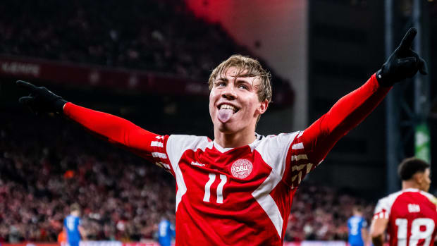 Rasmus Hojlund pictured celebrating after scoring for Denmark against Finland in March 2023