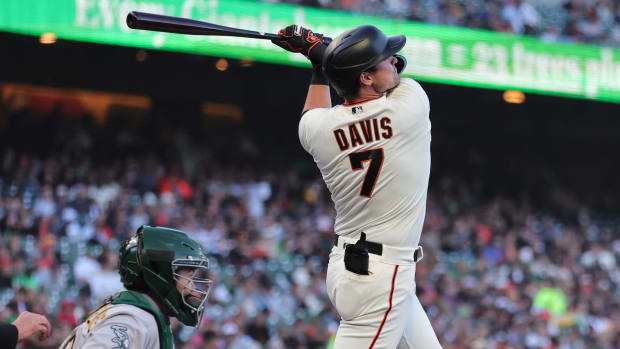 SF Giants third baseman J.D. Davis (7) hits a two-run home run at Oracle Park (2023)