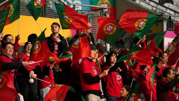 Portugal supporters cheer while Portugal plays the Netherlands at the Women's World Cup.