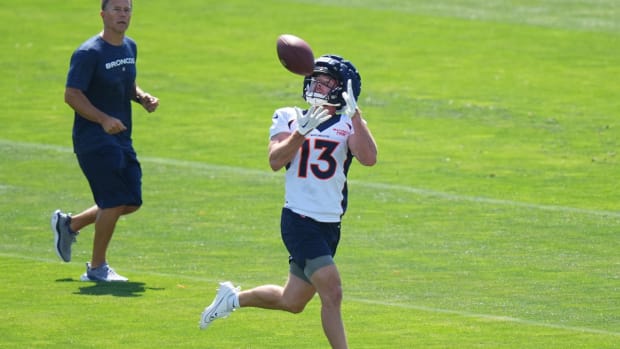 Denver Broncos wide receiver Taylor Grimes (13) during training camp drills at the Centura Health Training Center.
