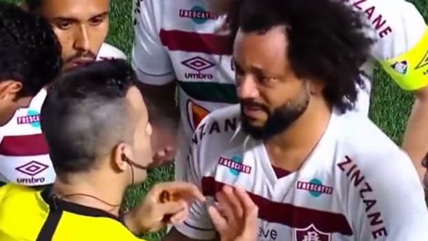 Marcelo pictured (right) being spoken to by referee Piero Maza moments before receiving a red card during Fluminense's 1-1 draw with Argentinos Juniors in August 2023