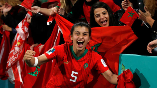 Morocco's Nesryne El Chad celebrates with fans after advancing at World Cup
