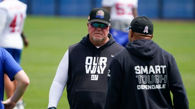 New York Giants defensive coordinator Don \"Wink\" Martindale, left, and defensive backs coach Jerome Henderson on the field during day two of mandatory minicamp at the Giants training center on Wednesday, June 14, 2023, in East Rutherford.