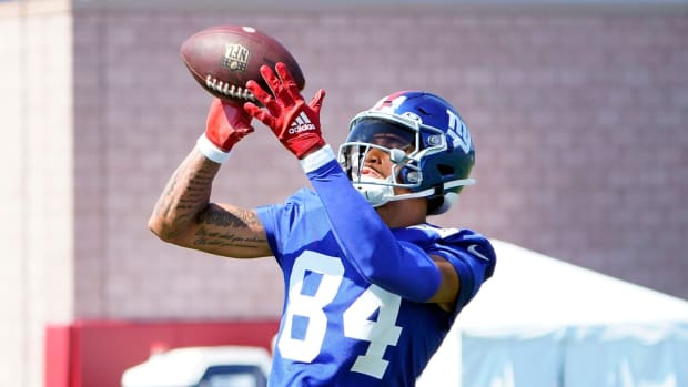 New York Giants rookie wide receiver Jalin Hyatt (84) catches the ball during training camp in East Rutherford on Monday, July 31, 2023.