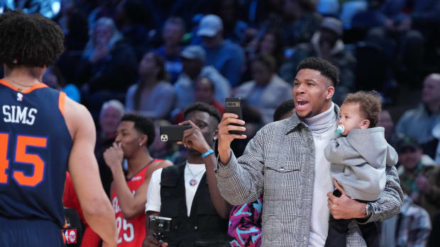 Milwaukee Bucks forward Giannis Antetokounmpo reacts after a dunk by New York Knicks center Jericho Sims (45) in the Dunk Contest during the 2023 All Star Saturday Night