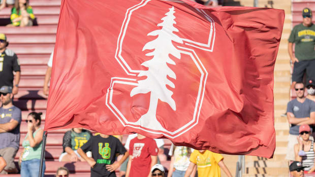 Oct 2, 2021; Stanford, California, USA; Stanford Cardinal flag waves in the air during overtime against the Oregon Ducks at Stanford Stadium. Mandatory Credit: Stan Szeto-USA TODAY Sports
