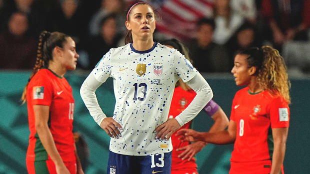 USWNT forward Alex Morgan looks up with her hands on her hips during the U.S.'s 0-0 draw against Portugal at the Women's World Cup.