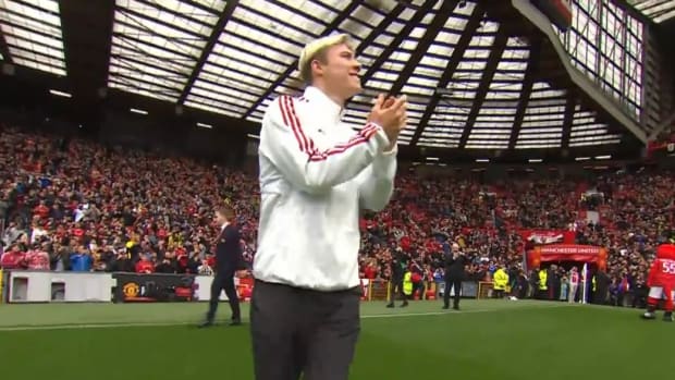 Rasmus Hojlund pictured applauding Manchester United fans at Old Trafford after completing a £72 million transfer from Atalanta in August 2023