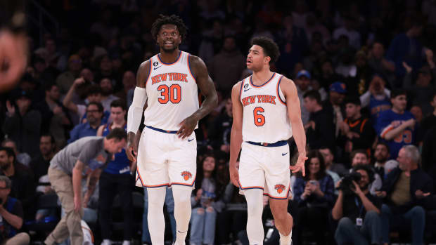 Mar 7, 2023; New York, New York, USA; New York Knicks forward Julius Randle (30) and guard Quentin Grimes (6) walk off the court after the first half against the Charlotte Hornets at Madison Square Garden. Mandatory Credit: Vincent Carchietta-USA TODAY Sports