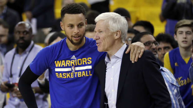Warriors star Stephen Curry with his Davidson coach, Bob McKillop.