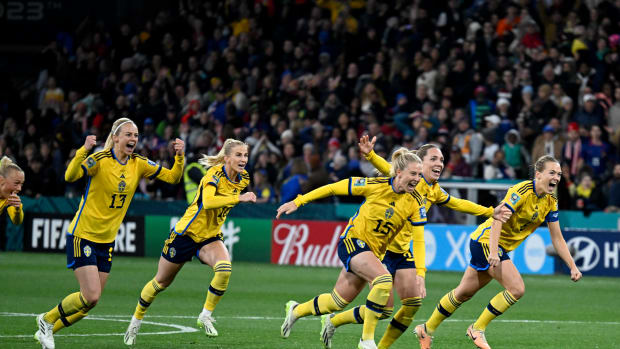 Sweden players pictured celebrating after beating the USA in a penalty shootout at the 2023 FIFA Women's World Cup