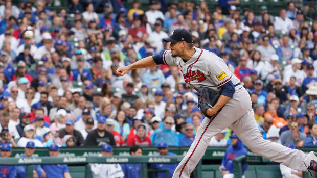 Aug 6, 2023; Chicago, Illinois, USA; Atlanta Braves starting pitcher Charlie Morton (50) throws the ball against the Chicago Cubs during the first inning at Wrigley Field.