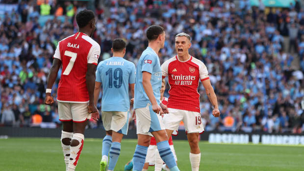 Arsenal's Leandro Trossard pictured (right) celebrating after scoring a late goal against Manchester City in the 2023 Community Shield game at Wembley