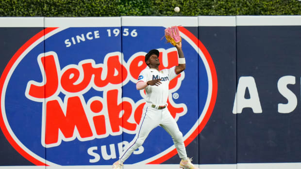 Aug 2, 2023; Miami, Florida, USA; Miami Marlins center fielder Jazz Chisholm Jr. (2) catches fly ball against the Philadelphia Phillies during the fourth inning at loanDepot Park.
