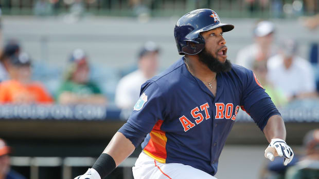 Mar 16, 2016; Kissimmee, FL, USA; Houston Astros designated hitter Jon Singleton (21) hits a two run double to right field during the sixth inning of a spring training baseball game against the Detroit Tigers at Osceola County Stadium. The Tigers won 7-3. Mandatory Credit: Reinhold Matay-USA TODAY Sports