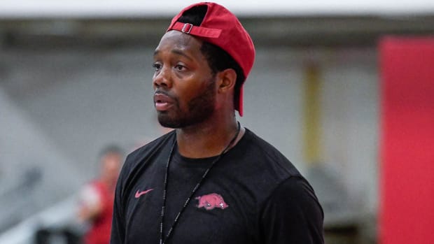 Razorbacks wide receivers coach Kenny Guiton at practice Thursday morning
