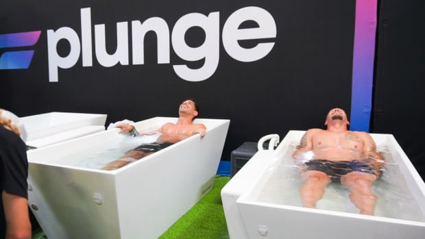 Two Plunge Cold Plunge tubs side by side being used by men.