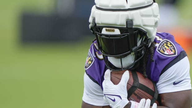 Jul 27, 2023; Owings Mills, MD, USA; Baltimore Ravens running back Melvin Gordon III (33) performs a drill during training camp practice at Under Armour Performance Center.