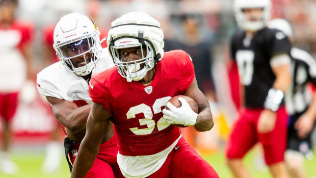 RB Marlon Mack runs with the ball during the Arizona Cardinals' annual Red & White practice at State Farm Stadium in Glendale on Aug. 5, 2023.