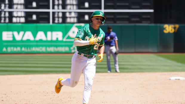Oakland Athletics second baseman Zack Gelof (20) prepares to round third base after hitting a home run against the Texas Rangers in the sixth inning at Oakland-Alameda County Coliseum.