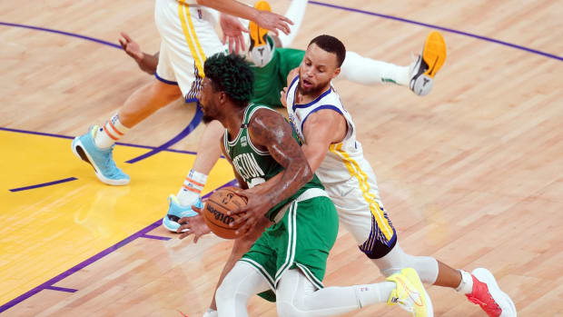 Jun 5, 2022; San Francisco, California, USA; Golden State Warriors guard Stephen Curry (30) defends against Boston Celtics guard Marcus Smart (36) in the first half during game two of the 2022 NBA Finals at Chase Center. Mandatory Credit: Cary Edmondson-USA TODAY Sports