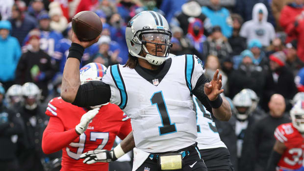 Panters quarterback Cam Newton looks for a receiver against Buffalo.