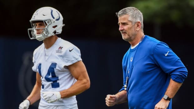 Jun 7, 2022; Indianapolis, Indiana, USA; Indianapolis Colts head coach Frank Reich jogs off the field during minicamp at the Colts practice facility.