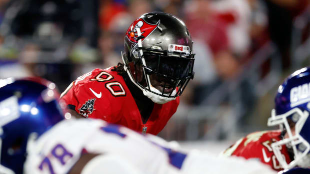 Nov 22, 2021; Tampa, Florida, USA; Tampa Bay Buccaneers outside linebacker Jason Pierre-Paul (90) looks on against the New York Giants during the second quarter at Raymond James Stadium. Mandatory Credit: Kim Klement-USA TODAY Sports