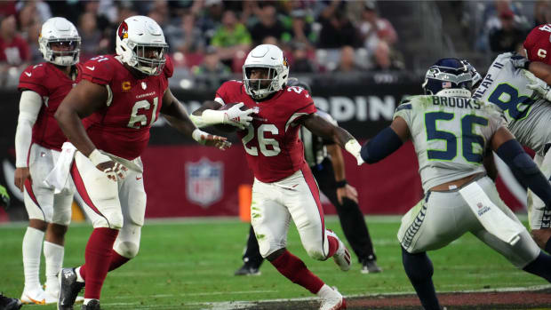 Arizona Cardinals running back Eno Benjamin (26) runs with the ball against the Seattle Seahawks during the second half at State Farm Stadium. Joe Camporeale-USA TODAY Sports