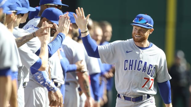 Chicago Cubs OF Clint Frazier gets high fives on Opening Day