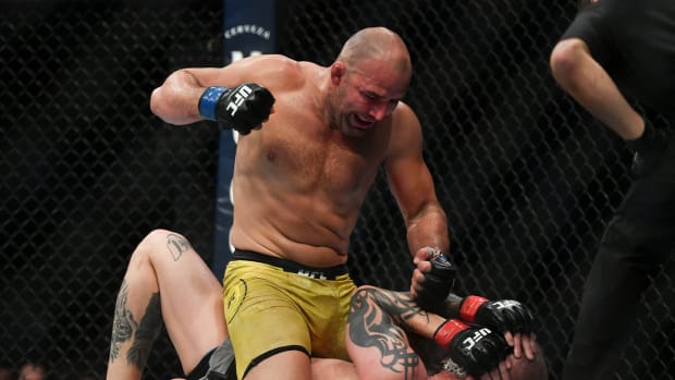 May 13, 2020; Jacksonville, Florida, USA; Anthony Smith (red gloves) fights Glover Teixeira (blue gloves) during UFC Fight Night at VyStar Veterans Memorial Arena.