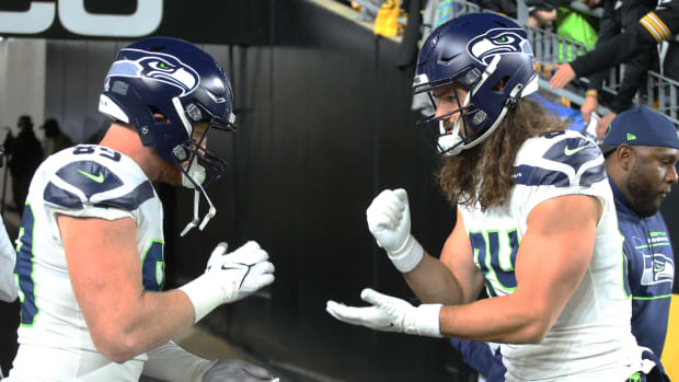NFL: Seattle Seahawks at Pittsburgh Steelers Oct 17, 2021; Pittsburgh, Pennsylvania, USA; Seattle Seahawks tight ends Will Dissly (89) and Colby Parkinson (84) play rock paper scissors as part of their pre-game routine before the game against the Pittsburgh Steelers at Heinz Field.
