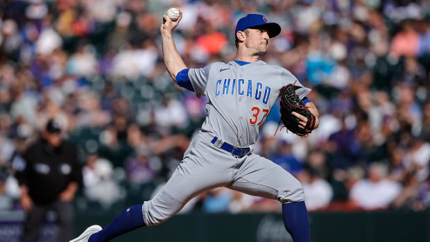 Apr 17, 2022; Denver, Colorado, USA; Chicago Cubs relief pitcher David Robertson (37) pitches in the ninth inning against the Colorado Rockies at Coors Field.