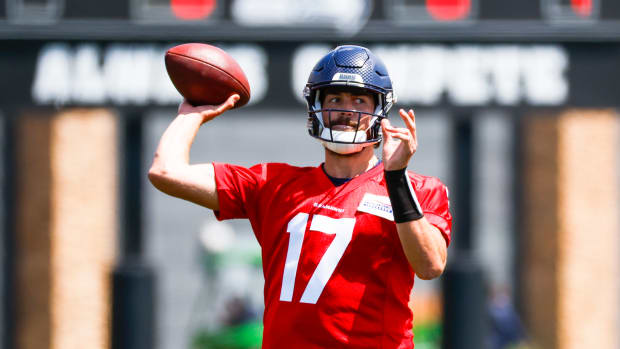 Seattle Seahawks quarterback Jacob Eason (17) participates in a drill during an OTA workout at the Virginia Mason Athletic Center.