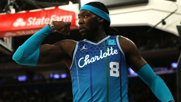 Hornets forward Montrezl Harrell (8) reacts after a dunk and a foul in a game against the Knicks.